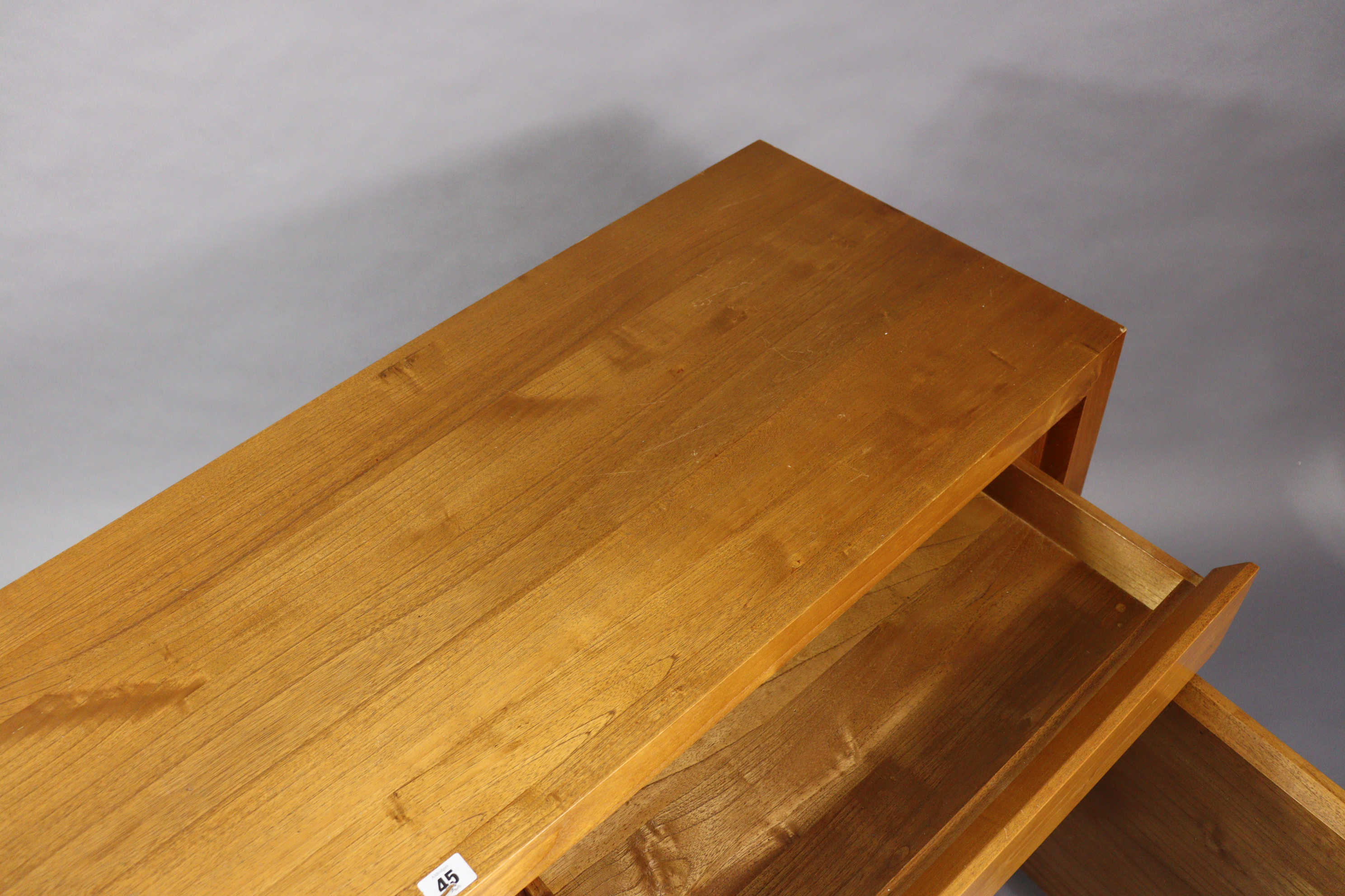 A teak sideboard fitted two frieze drawers above cupboard enclosed by a pair of panel doors, 55½” - Image 4 of 4