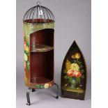 A Bargeware-type floral painted wooden cylindrical drinks cabinet on three shaped legs, 42” high;