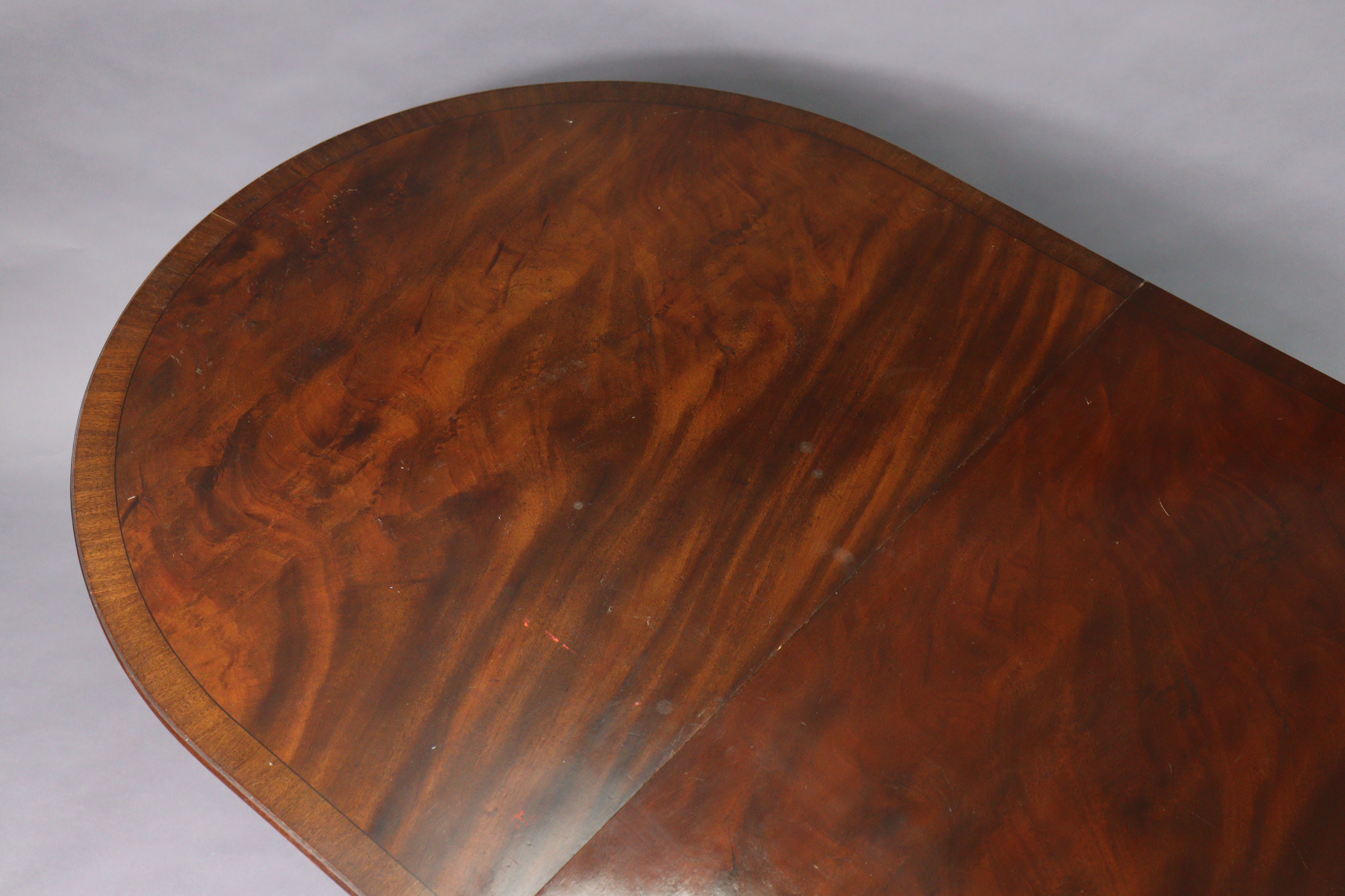 A regency-style inlaid-mahogany twin-pedestal tilt top extending dining table with d-shaped ends, - Image 2 of 9