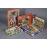 Five various one-thousand piece jigsaw puzzles, all boxed, as-new.