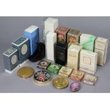 Four compacts; & various bottles of perfume, all boxed.