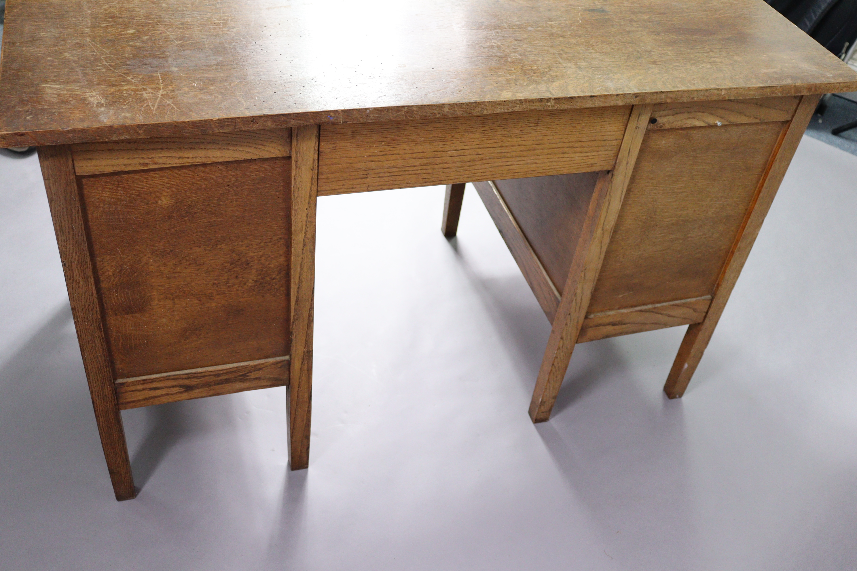 A mid-20th century oak knee-hole office desk fitted with two brushing slides above an arrangement of - Image 5 of 5