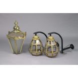 A pair of Inn lanterns of octagonal tapered form, 19” high, with brackets; & a brass lantern of