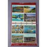 An album of 224 postcards – British views, circa mid/late 20th century.