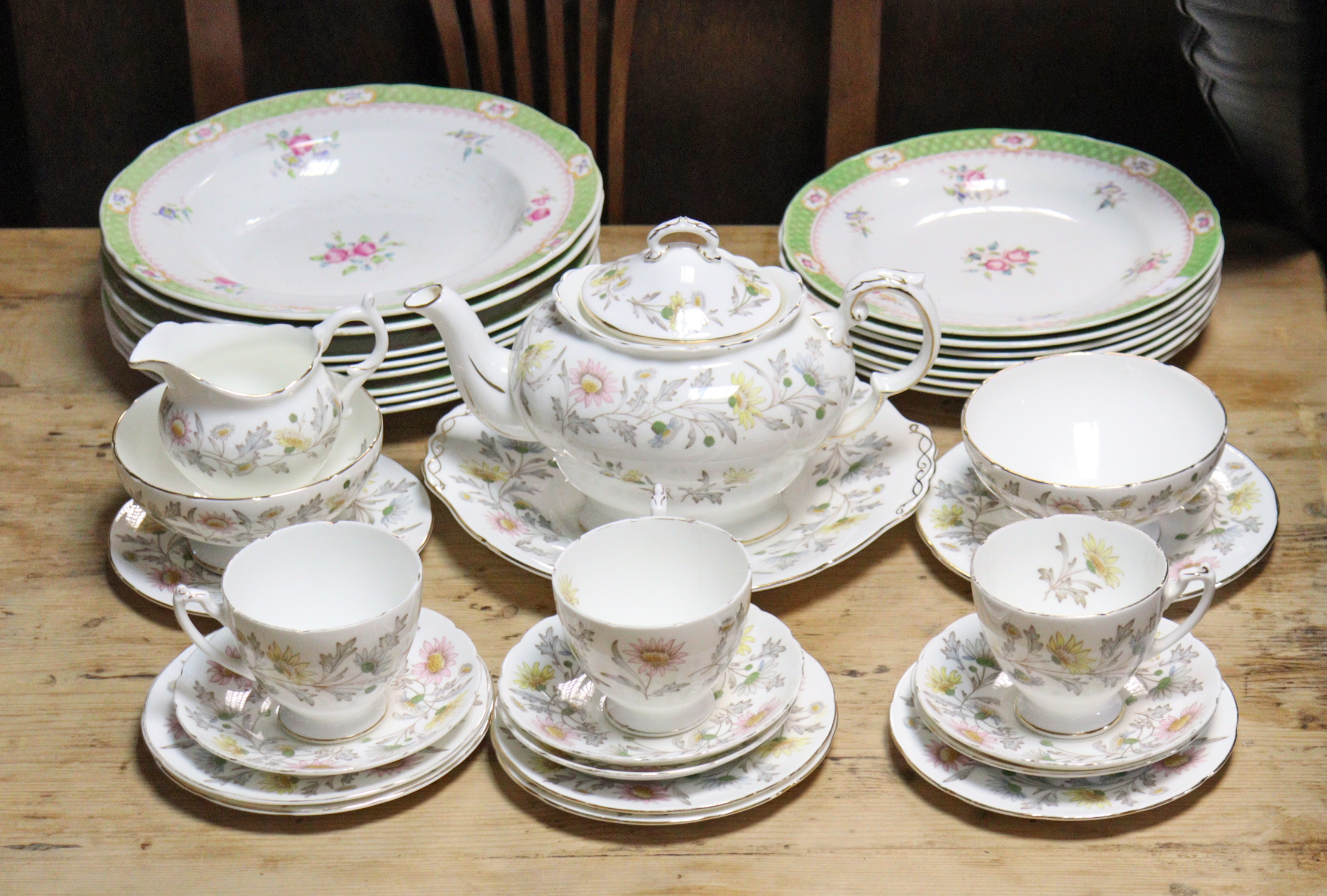 A Coalport bone china “Somerset” twenty-one piece part tea service; & a “Diamond Rose” fifteen piece