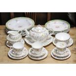 A Coalport bone china “Somerset” twenty-one piece part tea service; & a “Diamond Rose” fifteen piece