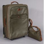 A mulberry suitcase, 26" high x 18" wide x 10" deep, & a matching handbag.