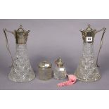 A pair of modern cut-glass ewers each with silver mounts, 12” high; & two cut-glass dressing table