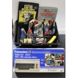 A Commodore “64” computer; a ditto “music maker”, both boxed; a Commodore “VIE 1525” graphic