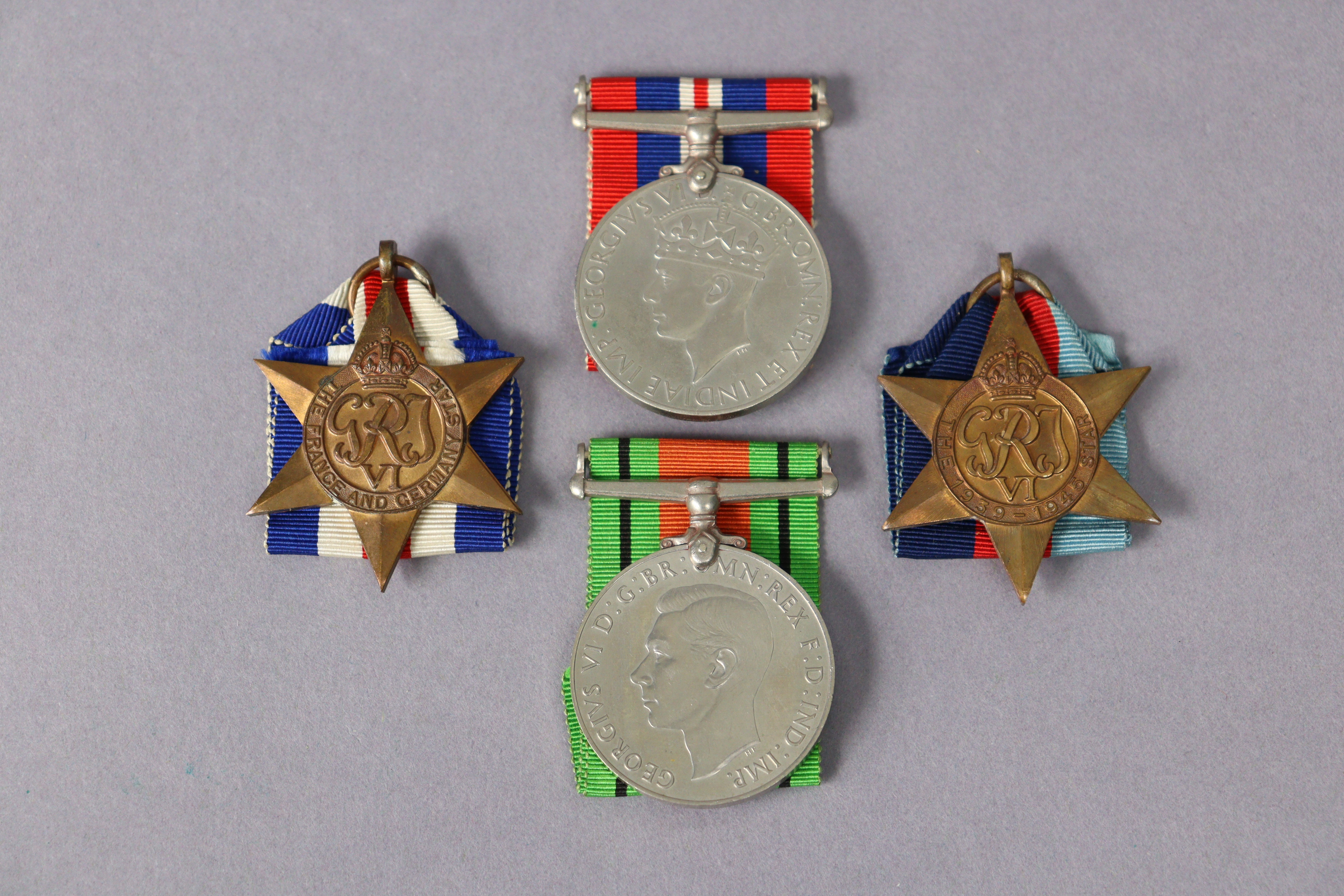 A Second World War group of four: 1939-45 Star, France & Germany Star, Defence Medal, & War Medal, - Image 2 of 2