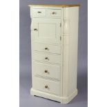 A Laura Ashley light oak & white finish upright cabinet fitted with an arrangement of six drawers &