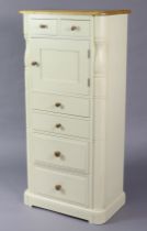 A Laura Ashley light oak & white finish upright cabinet fitted with an arrangement of six drawers &
