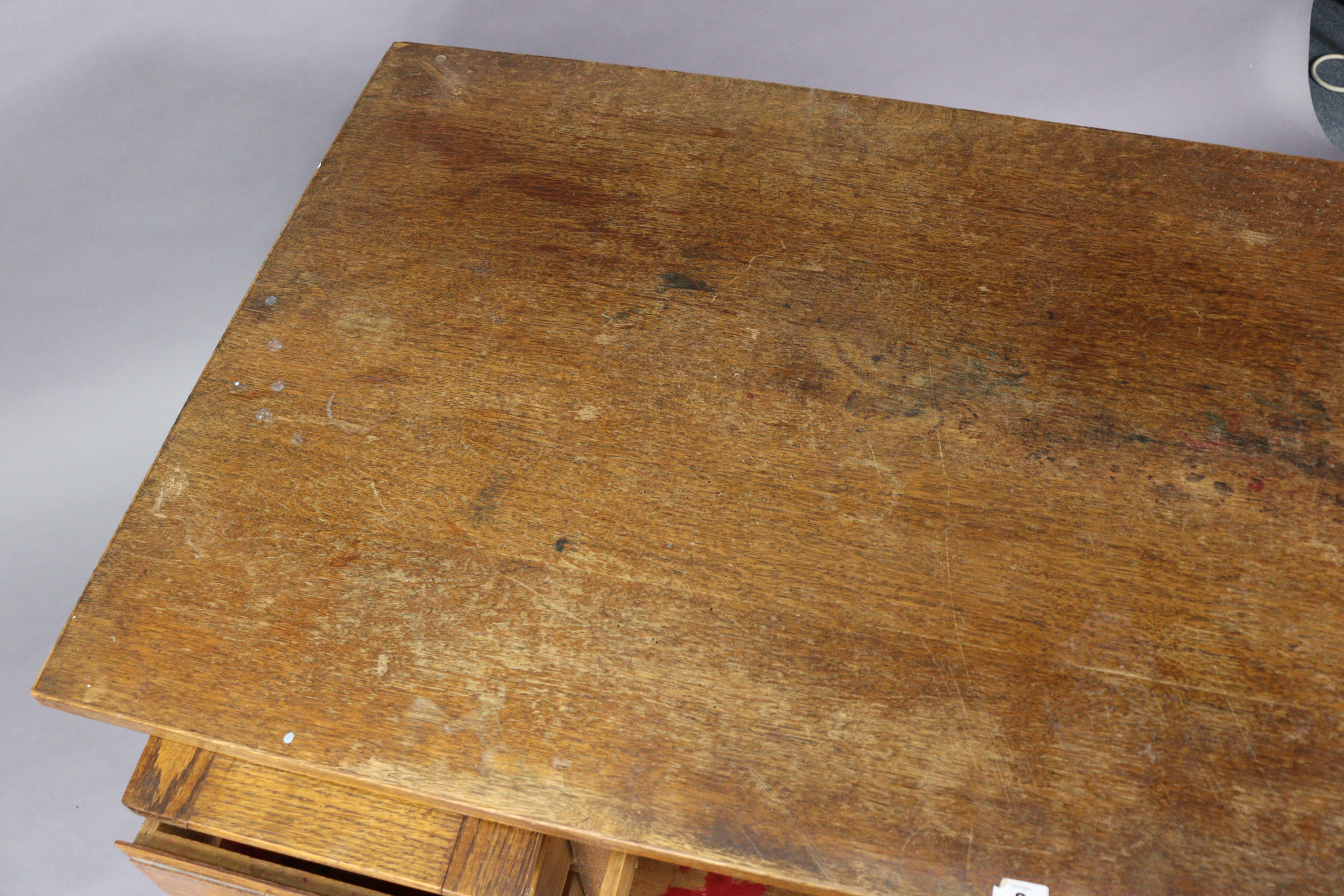 A mid-20th century oak knee-hole office desk fitted with two brushing slides above an arrangement of - Image 3 of 5