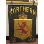 A 19thC black, red and gilt painted cast iron external hanging  advertising sign, featuring a lion