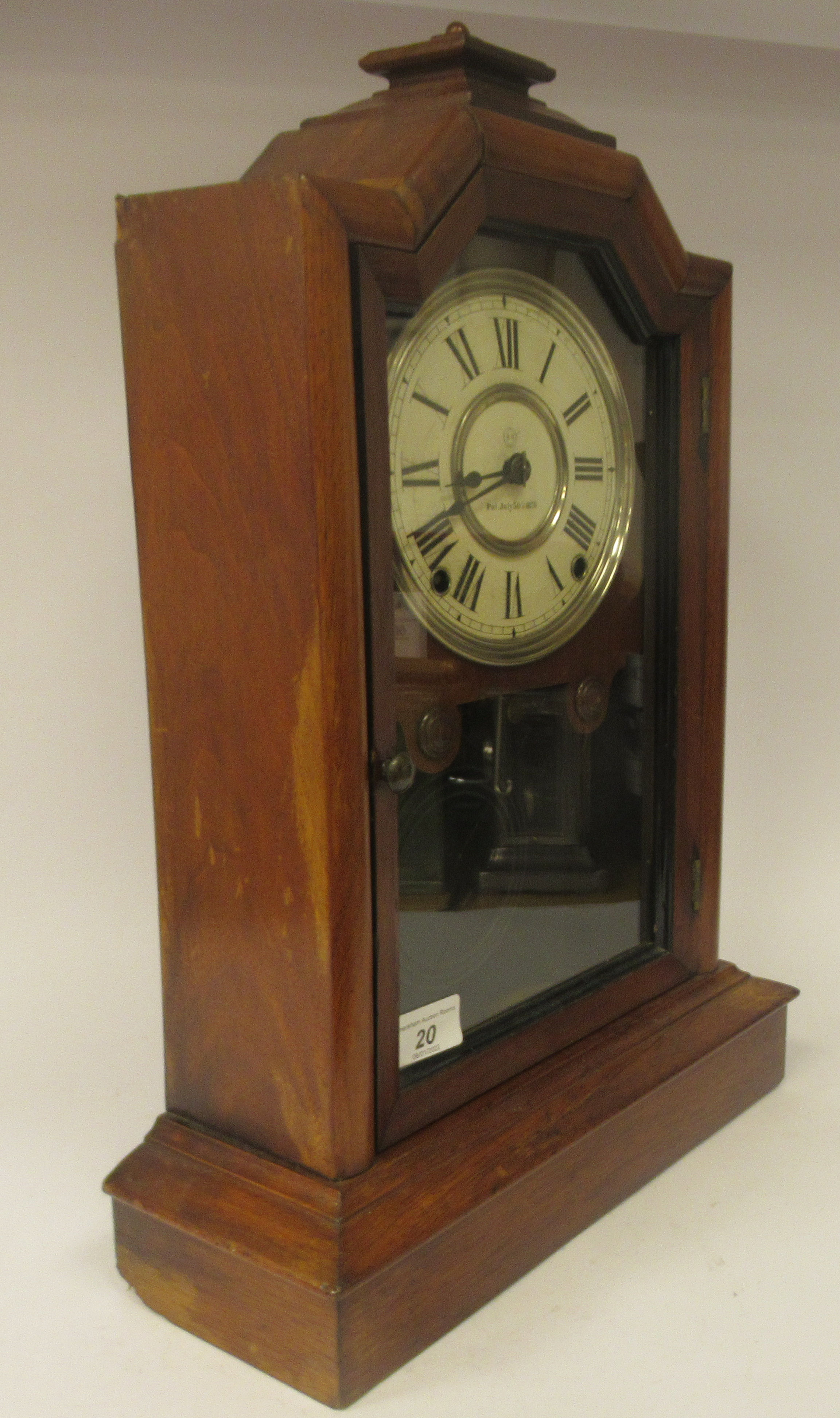 A late 19thC Seth Thomas walnut cased mantel clock with a stepped top, over a full height, glazed - Image 4 of 5