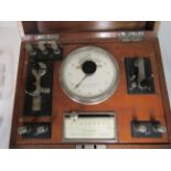 A vintage Electro Dynamic Medical Apparatus Co. electric therapy unit, fitted in a mahogany case