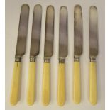 A set of six late 19thC silver plated fruit knives, on ivory handles