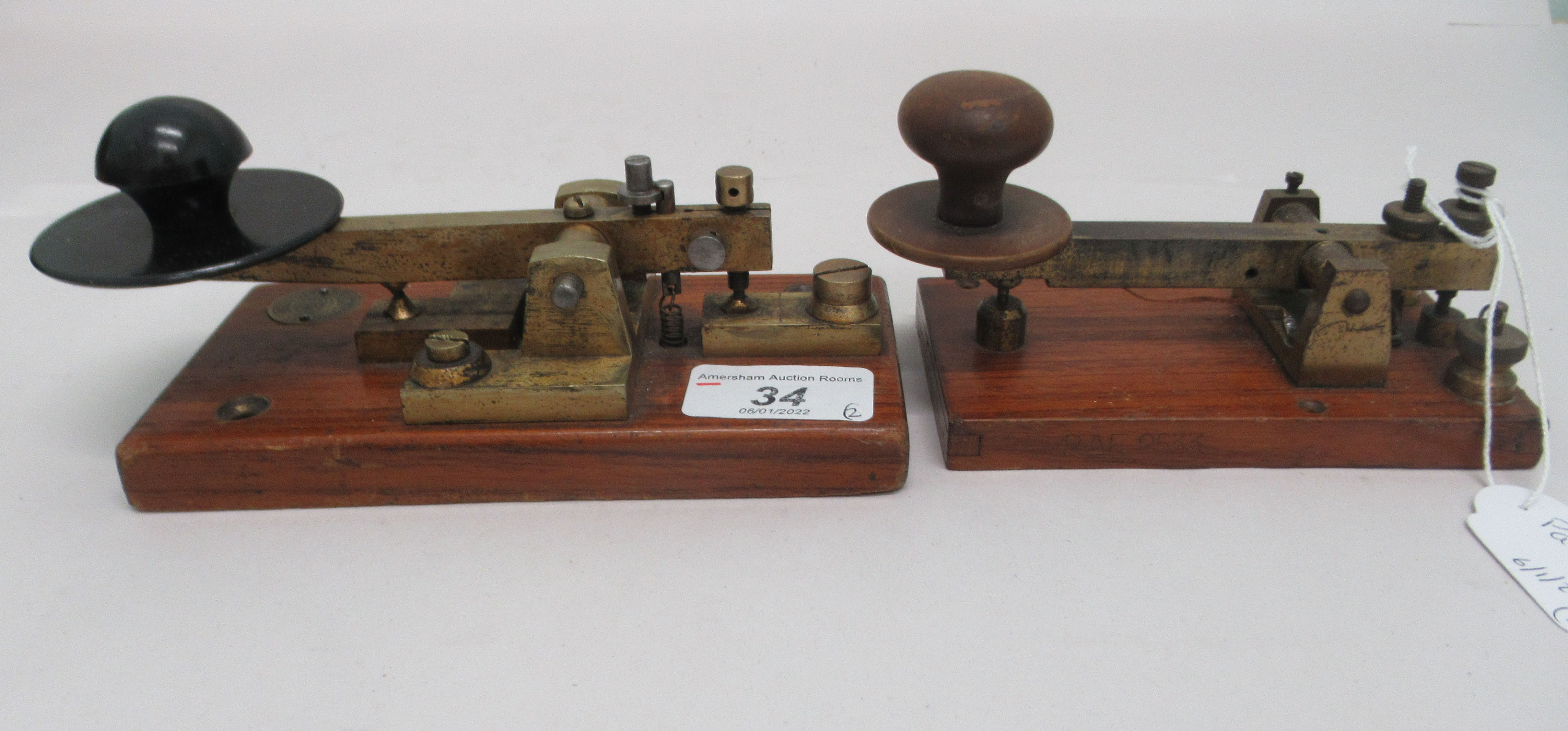 A vintage ATM Co Ltd Morse code key; and another similar