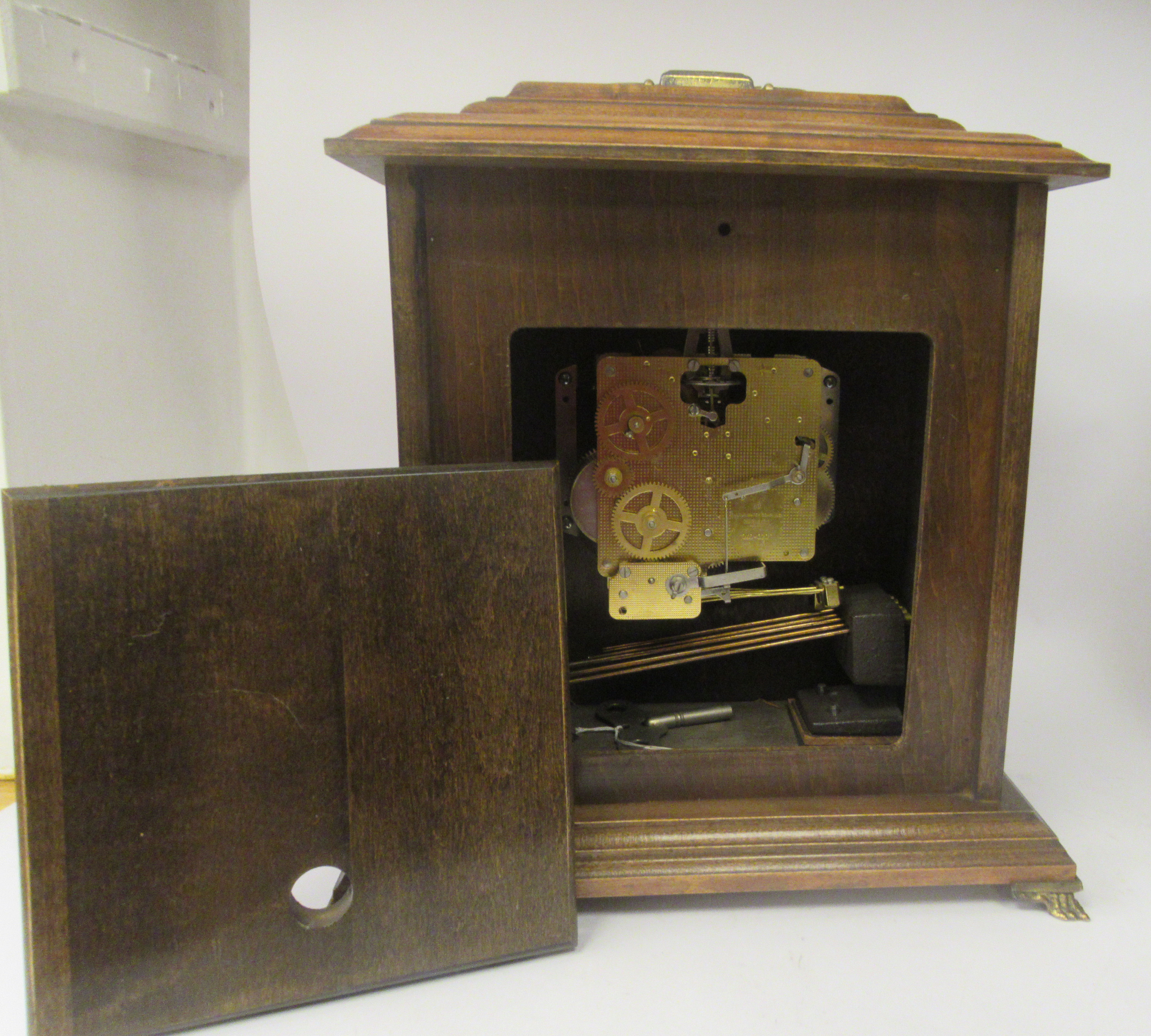 A late 20thC American Bulova mahogany cased bracket clock, the top with a folding handle, over a - Image 6 of 9