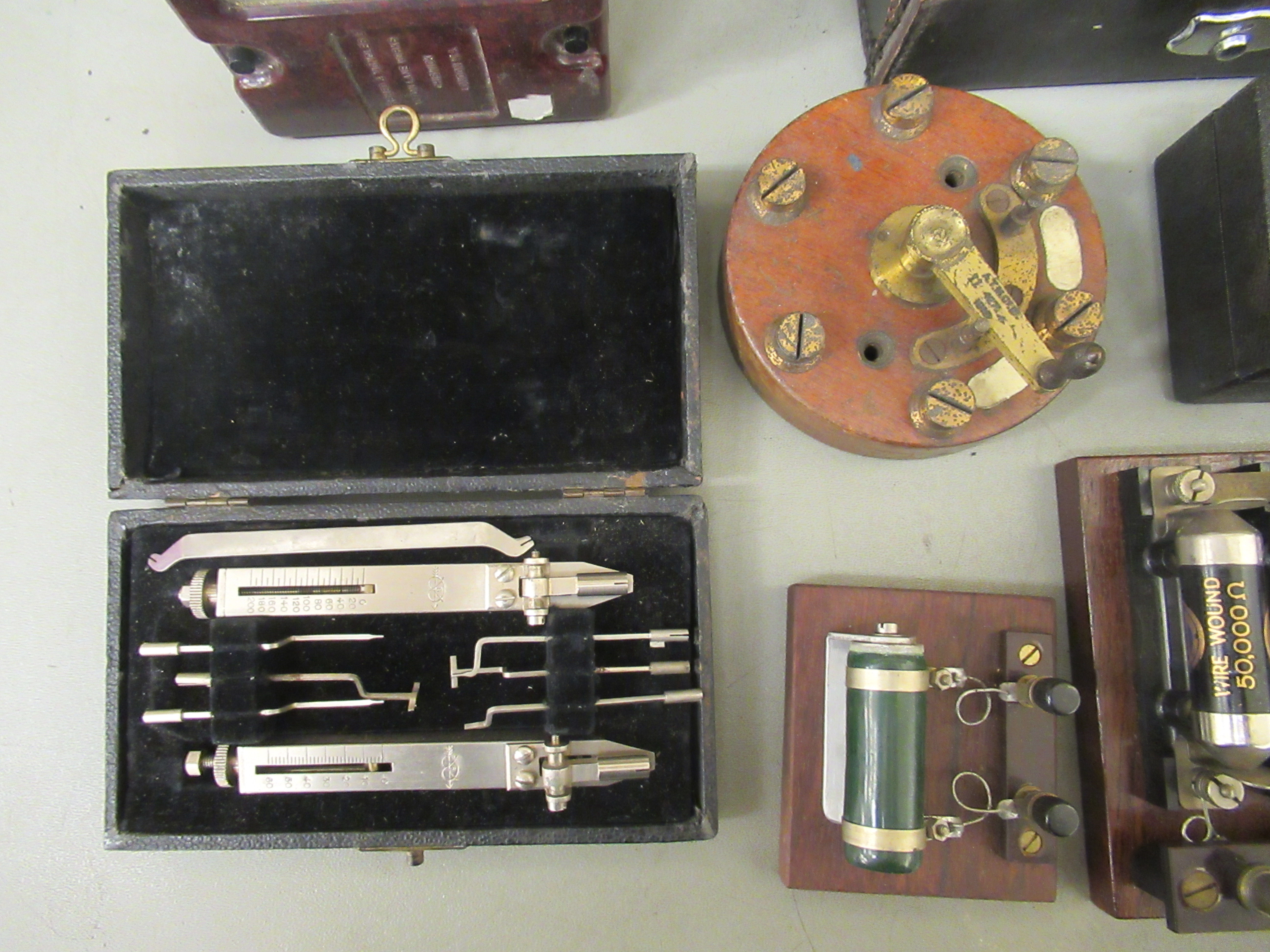 A vintage electro and mechanical instruments: to include an ATM rotary stud switch; and a Recordelec