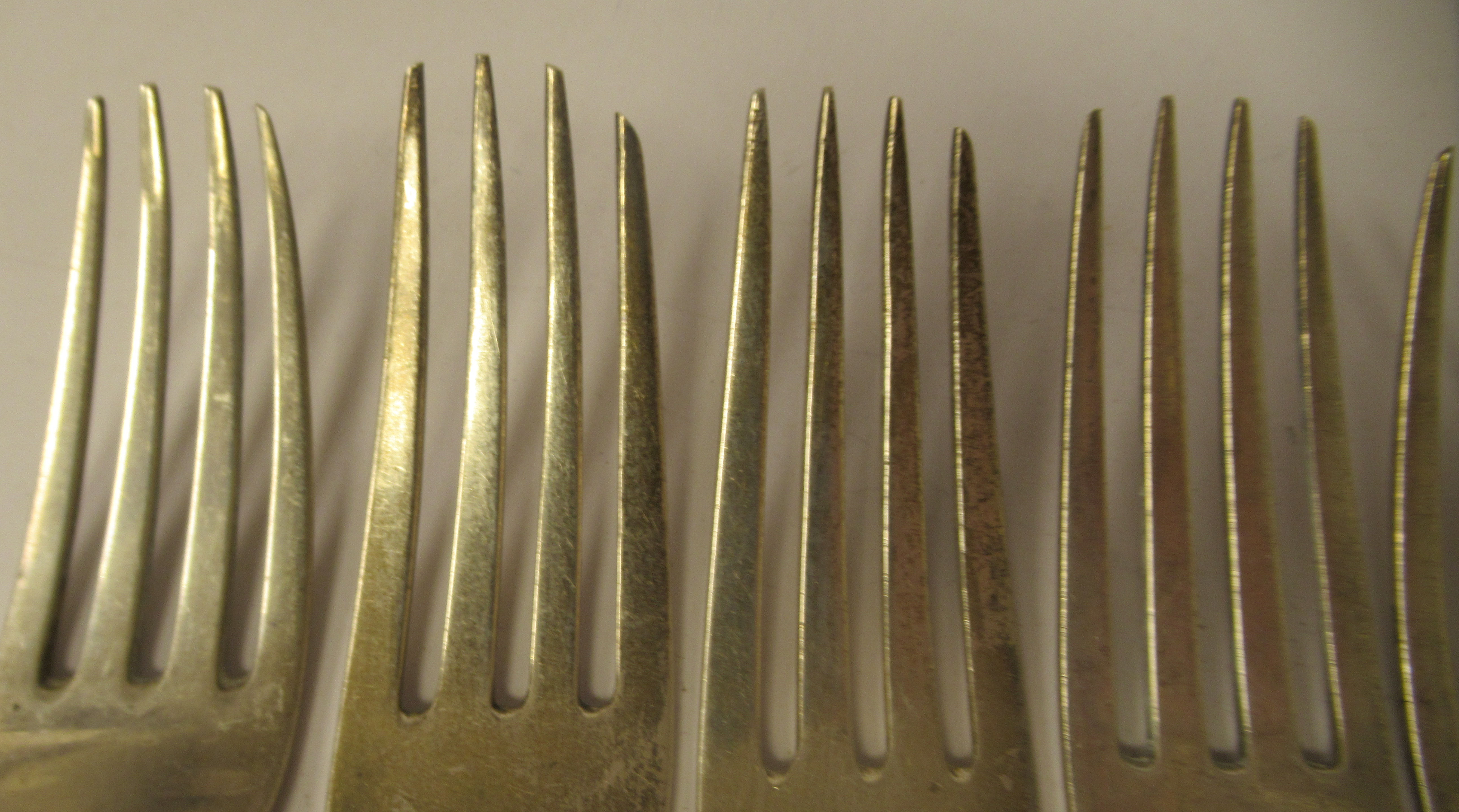 A matched set of seven 19thC silver fiddle pattern table forks  mixed marks - Image 5 of 9