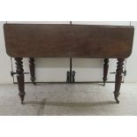 A George III mahogany Pembroke table with an end drawer and a facsimile on the reverse, raised on