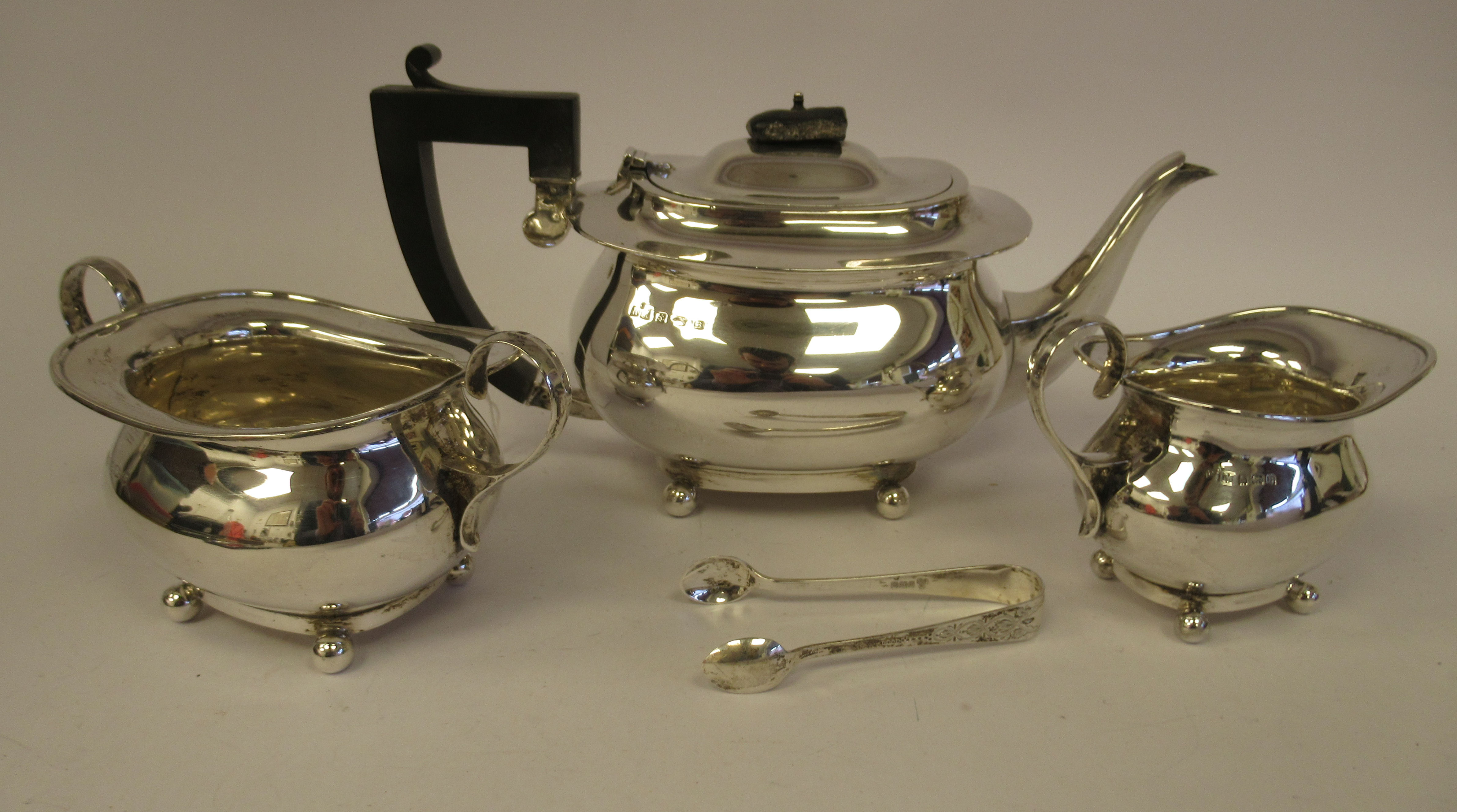 A three piece silver tea set of oval bulbous form, comprising a teapot with an S-shape spout, - Image 2 of 8
