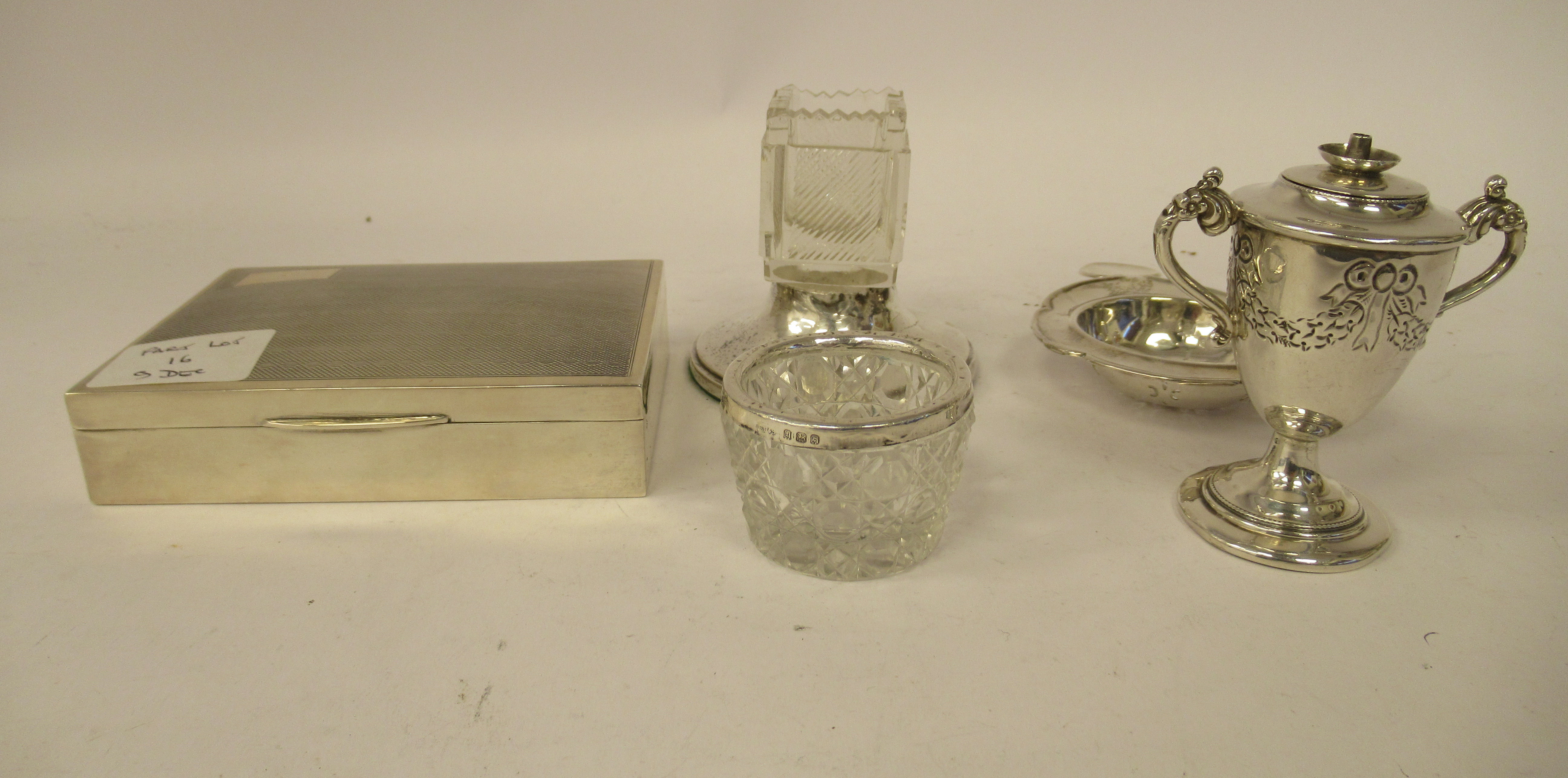 A cut glass open box vase design vesta holder, on a loaded silver base; another of miniature bowl