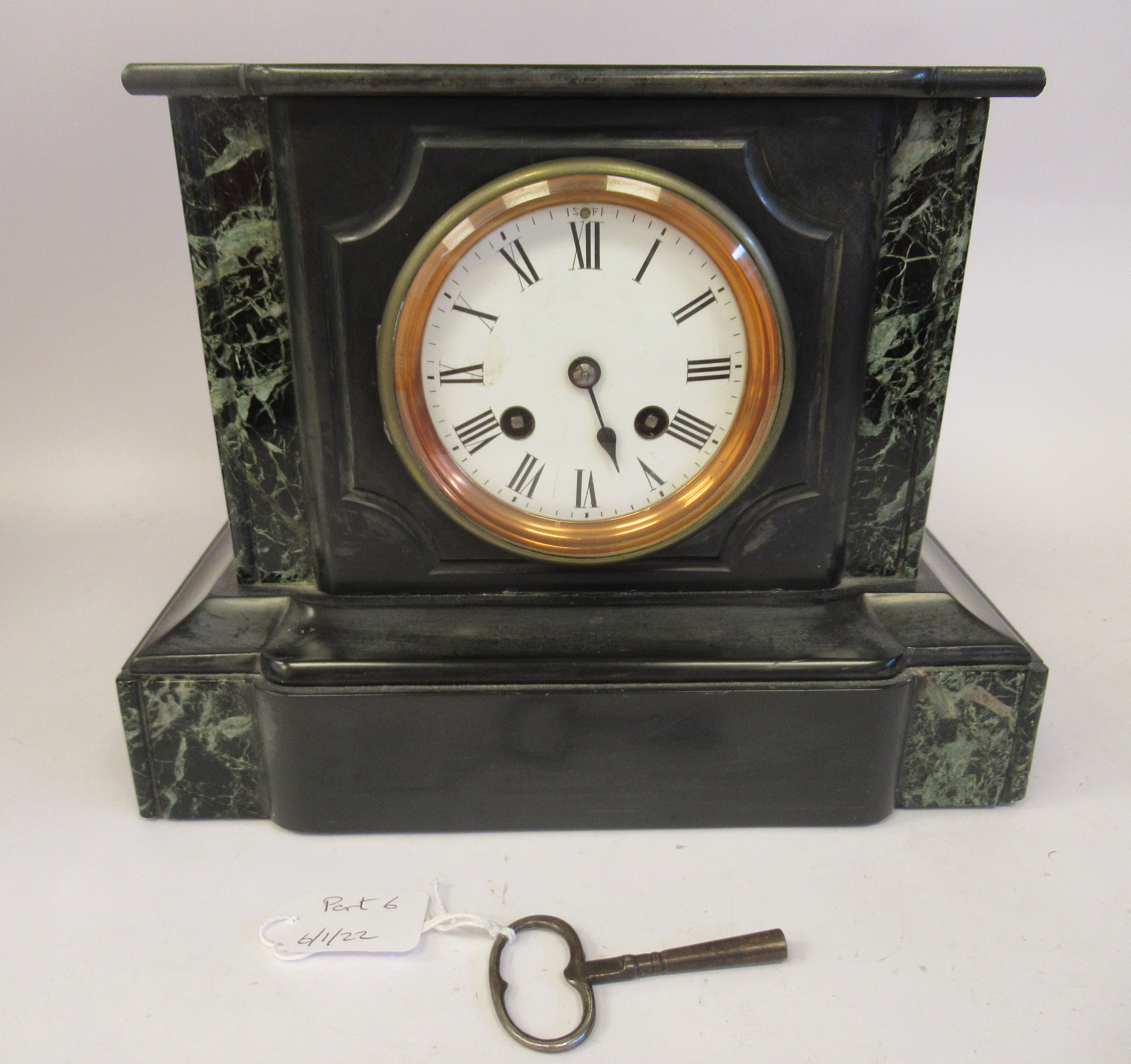 A late Victorian black slate and mottled green marble cased, platform top mantel clock; the bell