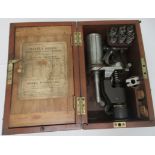 The McInnes-Dobbie patent steam engine indicator, in a mahogany carrying case