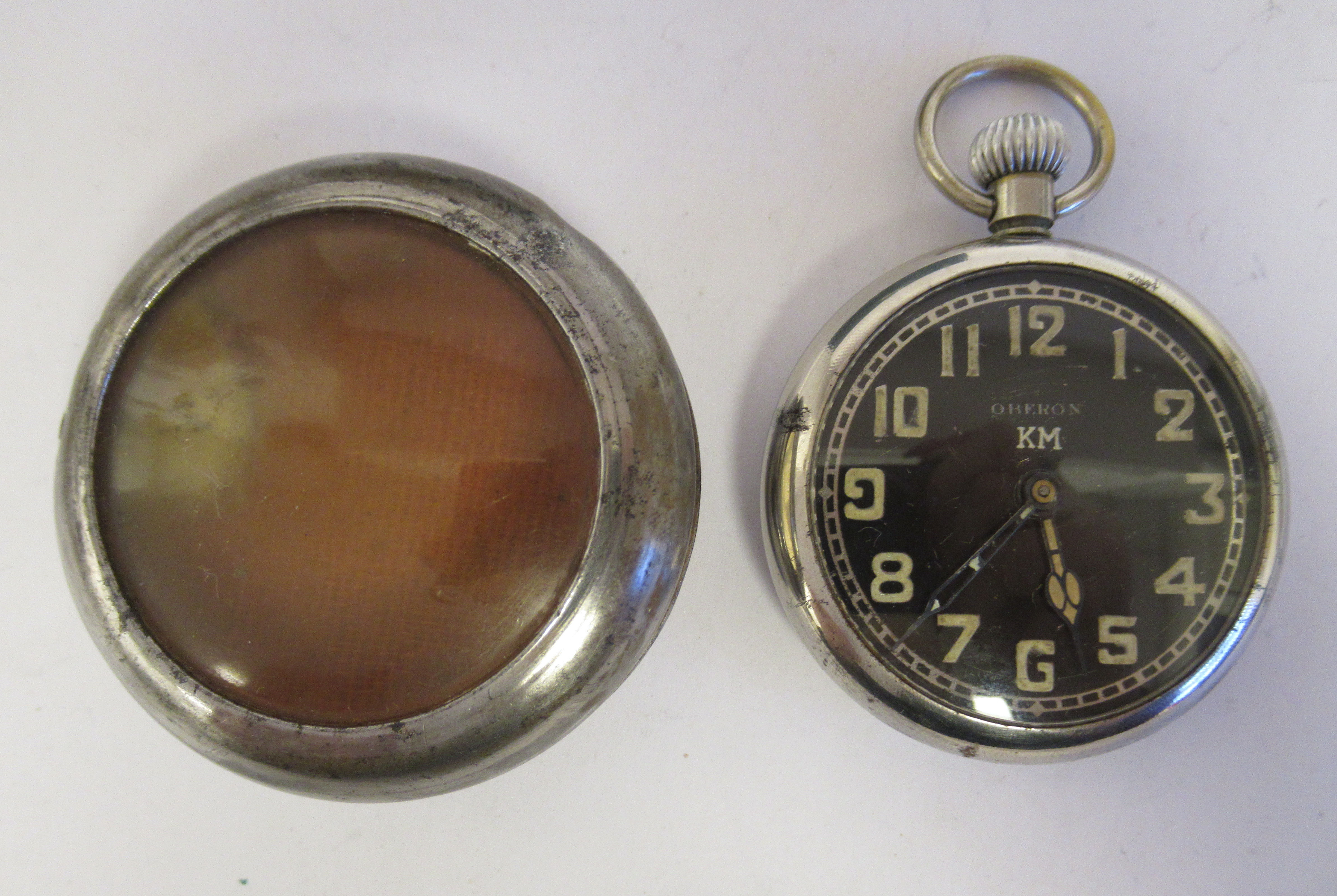 A World War II German KM Oberon nickel plated steel pair cased pocket watch, formerly the property