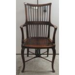 A late 19th/early 20thC (possibly American) cherrywood/mahogany framed comb back open arm chair,