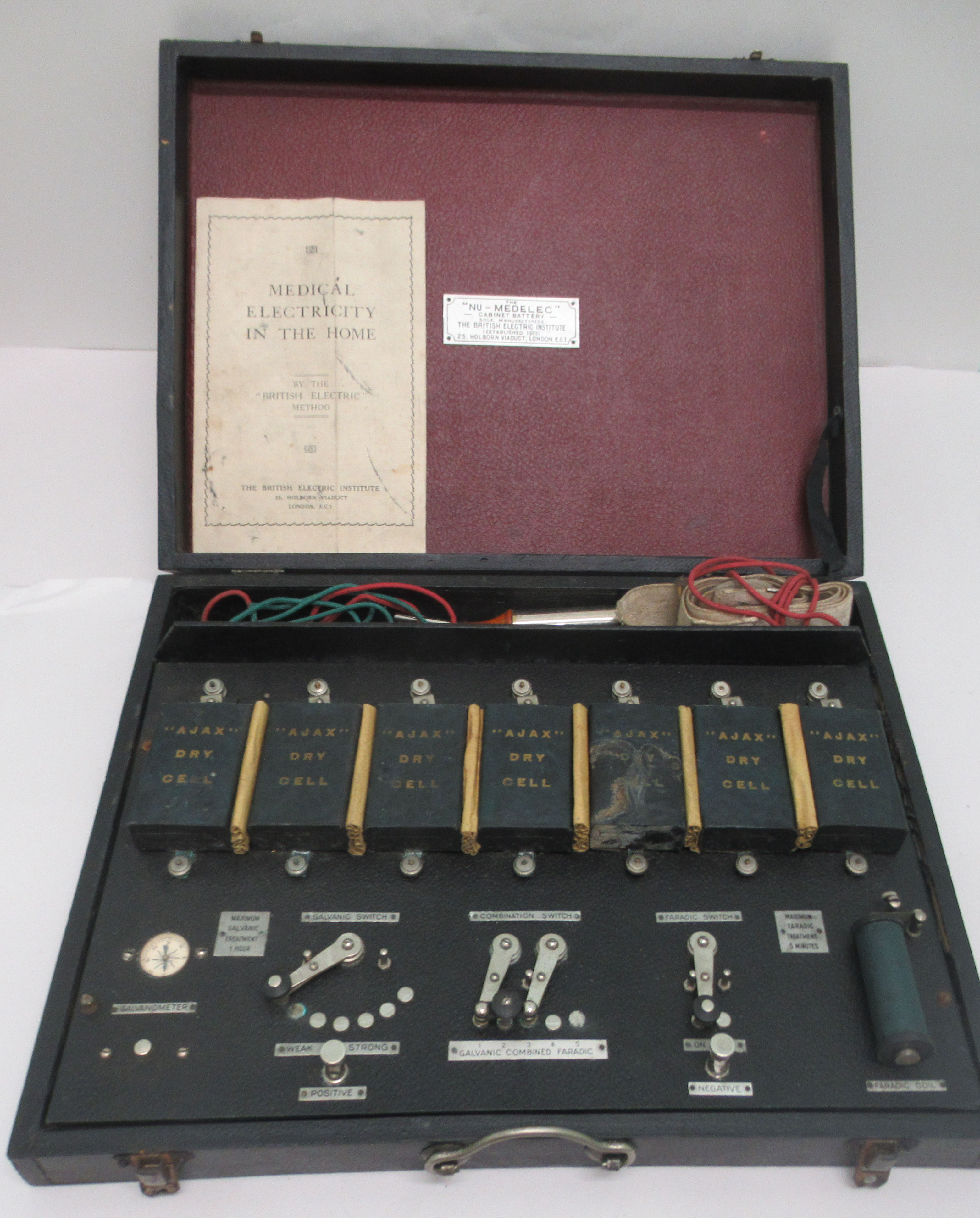 A vintage Nu-Medelec electrotherapy machine, in a carrying case