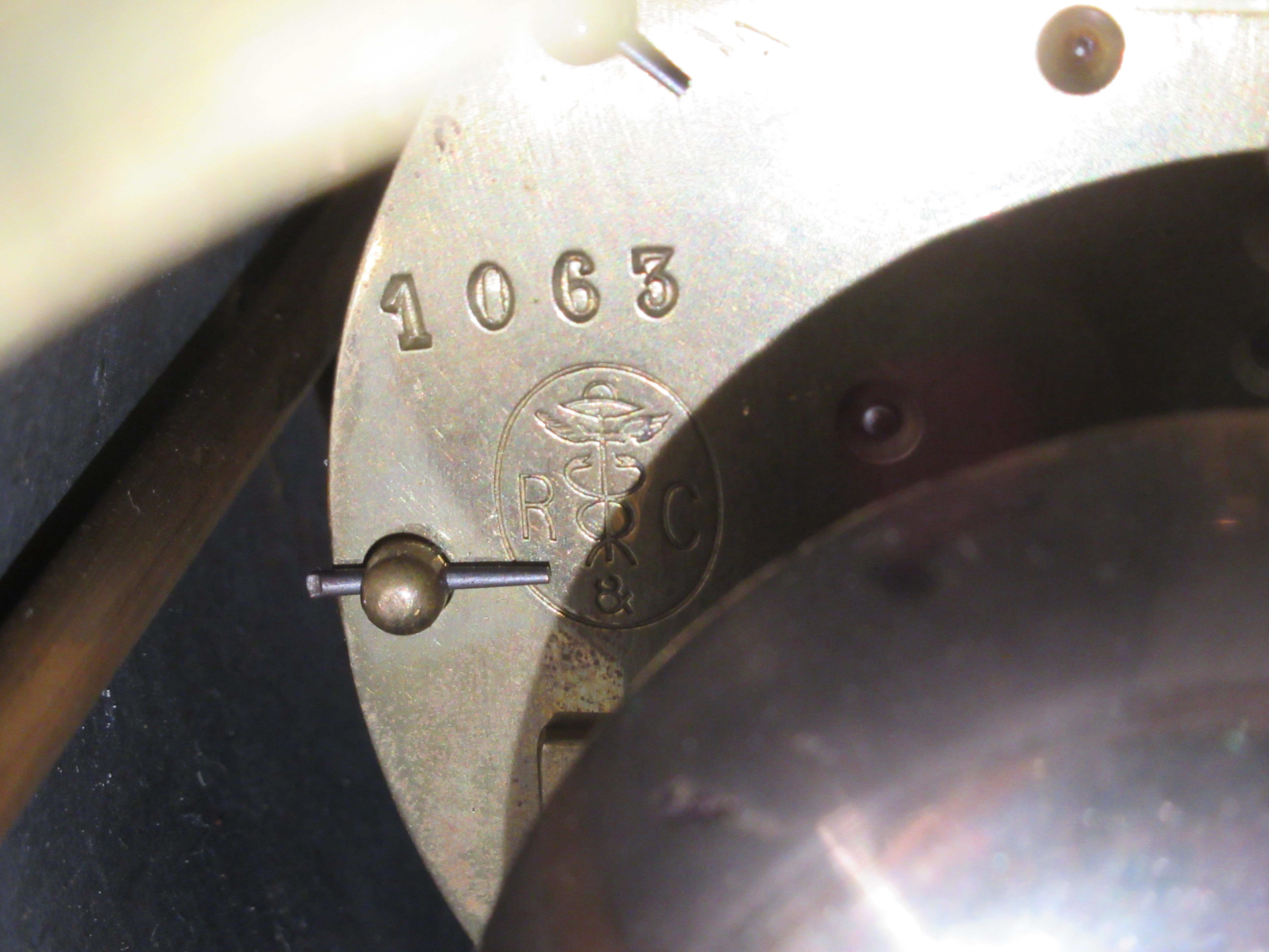 A late Victorian black slate and mottled green marble cased, platform top mantel clock; the bell - Image 8 of 8