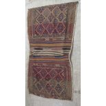 A North African saddle sack, decorated with repeating diamond patterns  36" x 76"