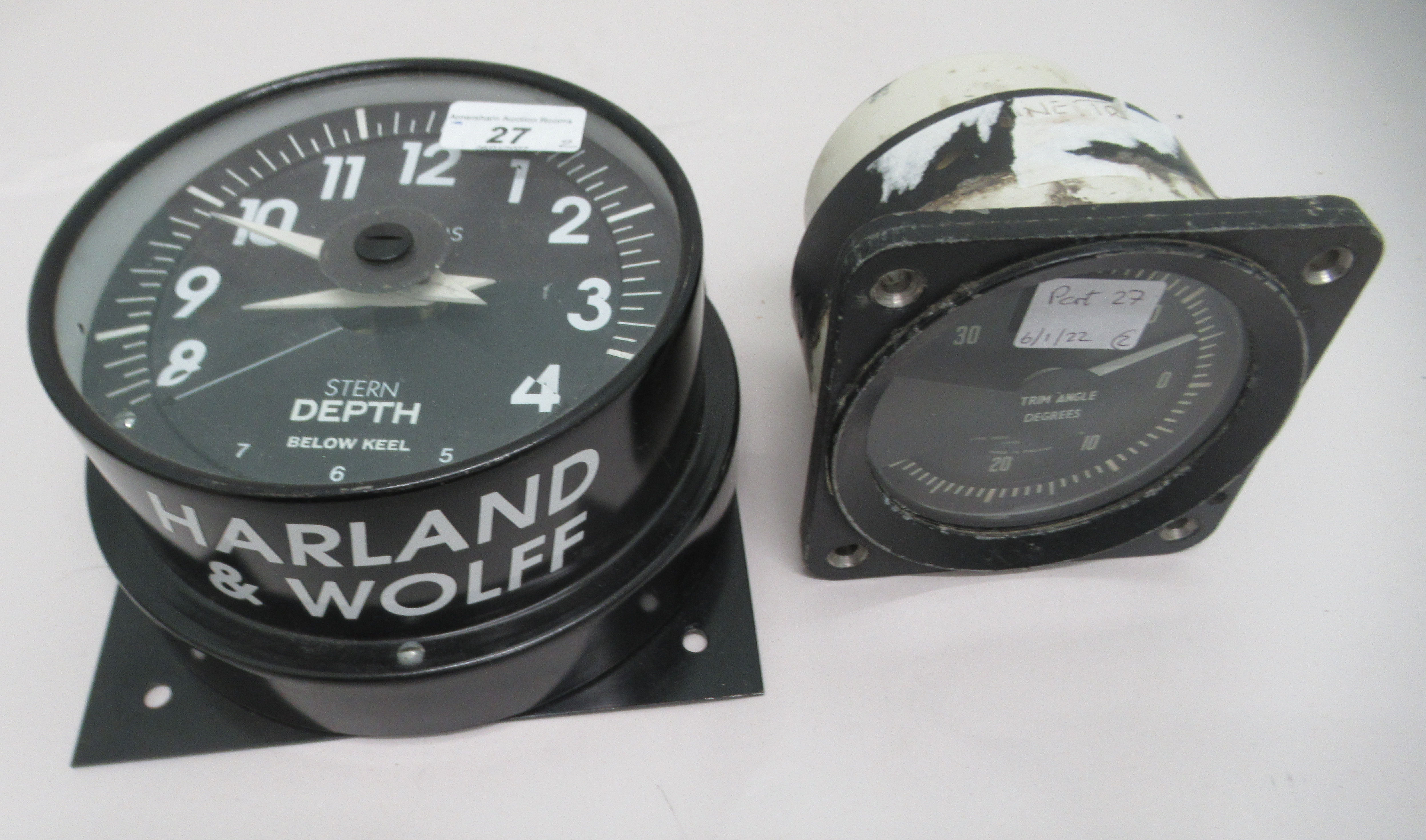 A Harland & Wolff submarine depth indicator; and a Smith's submarine trim indicator