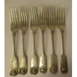 A matched set of six 19thC silver fiddle and shell pattern table forks  mixed marks