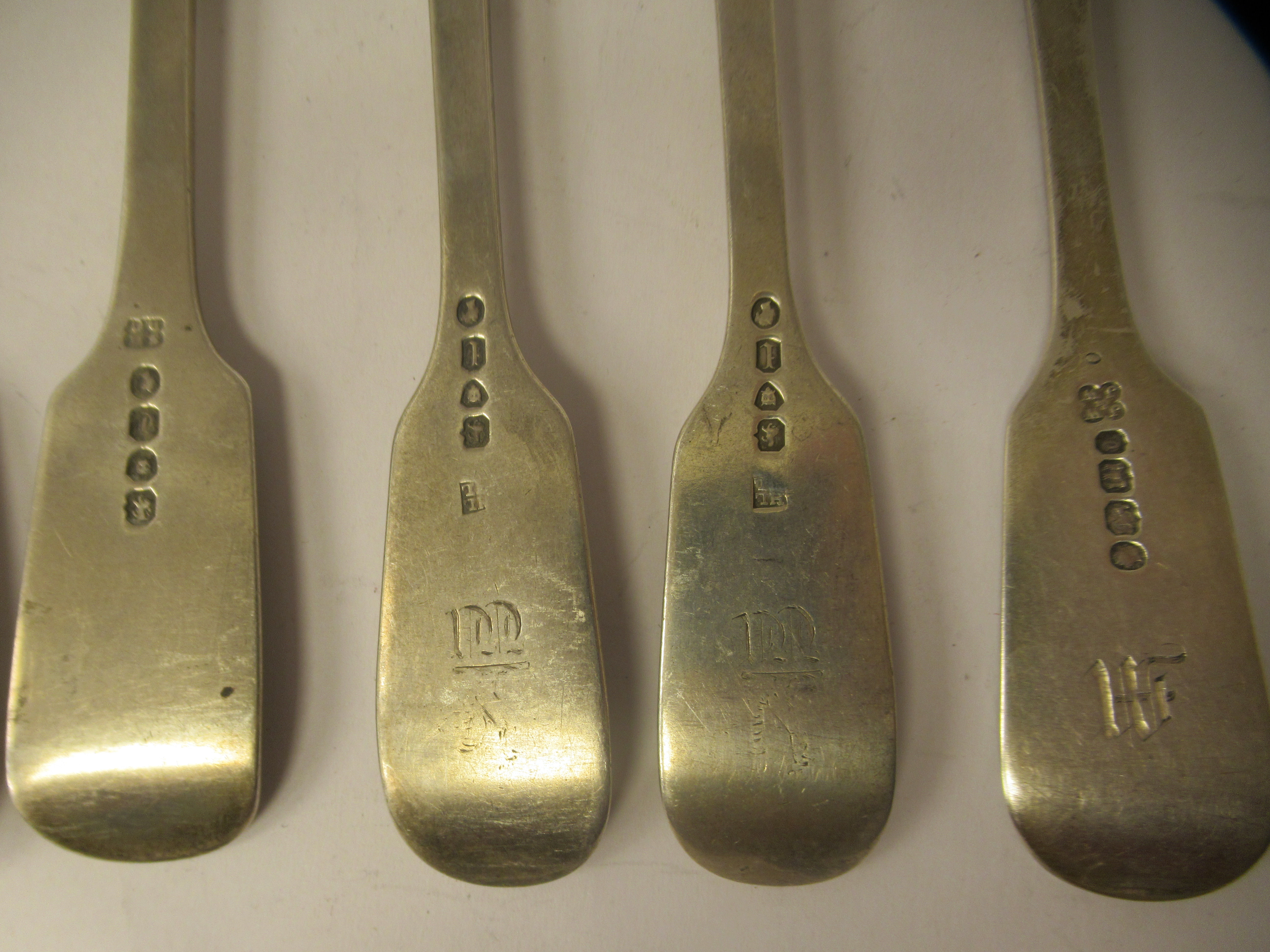 A matched set of seven 19thC silver fiddle pattern table forks  mixed marks - Image 7 of 9