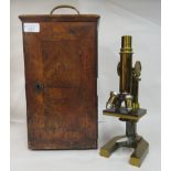 A late 19thC E Leitz Wetzlar, no.20800, lacquered brass microscope with three rotating lenses and