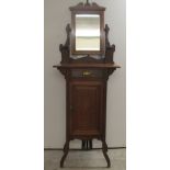 An Edwardian mahogany and other, vanity stand with a pivoting mirrored upstand, over a single drawer