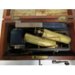 A late 19thC manual Magneto-Electro machine (for nervous and other deceases) in a mahogany case with