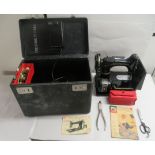 An electric Singer sewing machine, model no. ER318204  cased