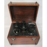 An early 20thC Cambridge Portable Potentiometer, fitted in a mahogany case