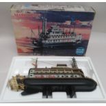 A 1960s Mark Twain novelty solid state radio, fashioned as a Mississippi paddle steamer, in the