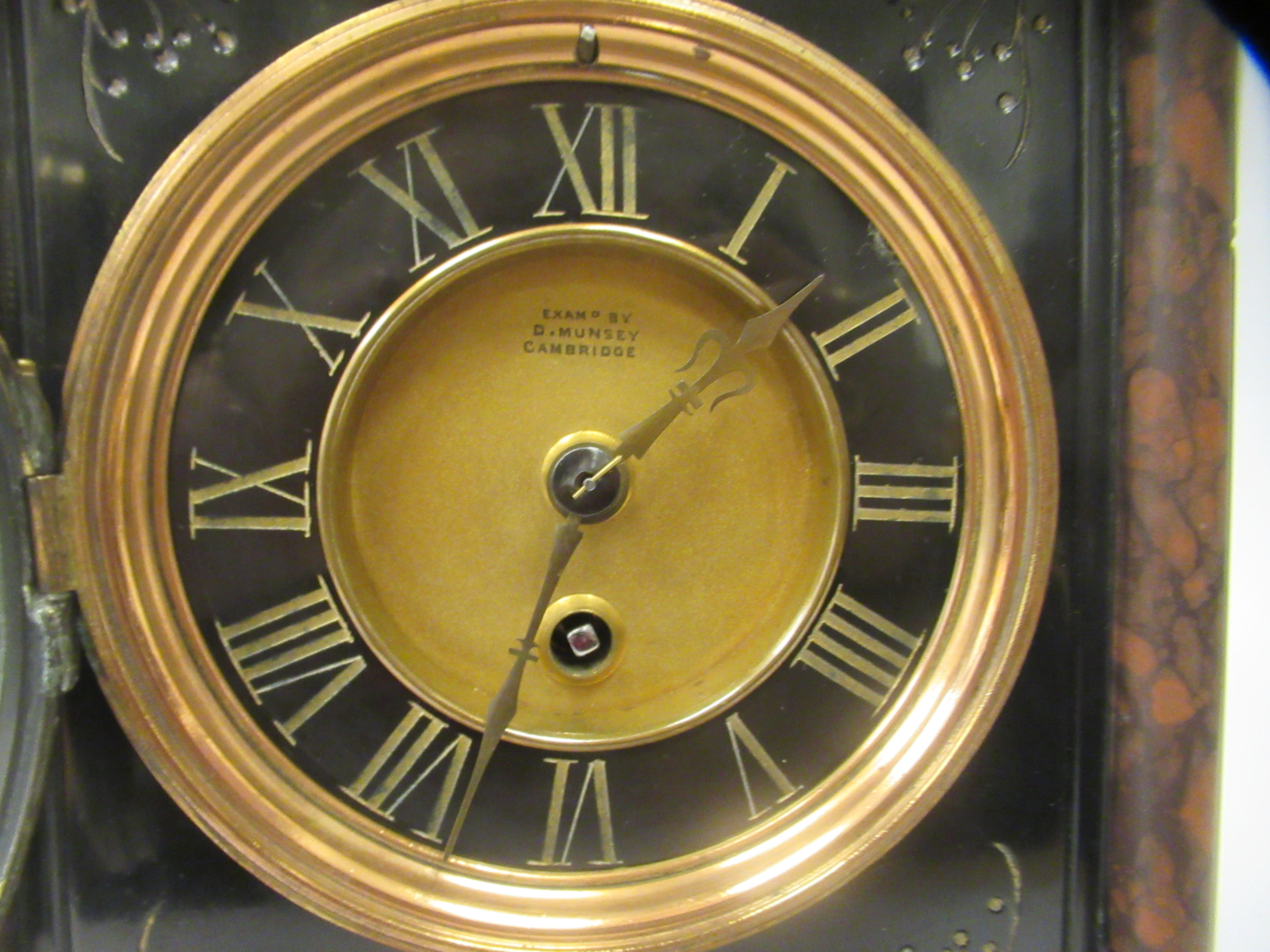 A late 19thC black slate and mottled iron red marble cased mantel timepiece with a platform top; the - Image 2 of 9