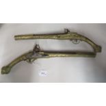 A pair of decoratively cast brass and steel flintlock pistols  approx 19"L overall