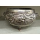 A 19thC South East Asian Paktong censer of squat, bulbous form with opposing dragon handles,