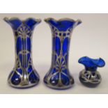 A pair of early 20thC blue glass vases of waisted and part bulbous cylindrical form, having