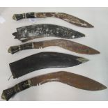 Three similar Indian kukris with inlaid handles, the blades approx 12"L with the remains of two