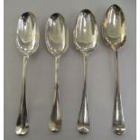 Four Georgian silver Old English pattern table spoons  mixed marks